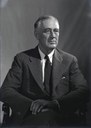 Leon A. Perskie: Original black & white transparency of Franklin D. Roosevelt (1882–1945) taken at 1944 Official Campaign Portrait session by Leon A. Perskie, Hyde Park, New York, August 21, 1944. Gift of Beatrice Perskie Foxman and Dr. Stanley B. Foxman. August 21, 1944. Source: FDR Presidential Library & Museum via Wikimedia Commons, http://commons.wikimedia.org/wiki/File:1944_portrait_of_FDR_%281%29.jpg. Creative Commons Attribution 2.0 Generic.