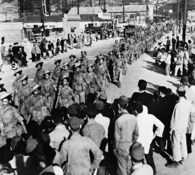 The 2/5th Royal Gurkha Rifles marching through Kure soon after their arrival in Japan as part of the Allied forces of occupation, black-and-white photograph, 1946, unknown photographer; source: Imperial War Museum IND 5209, http://www.iwm.org.uk/collections/item/object/205208269. 