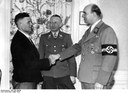 Begrüßung des "Millionsten Umsiedler" durch den "Reichsleiter Warthegau" 1944 IMG
