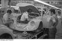 Lothar Schaack, Wolfsburg, VW Autowerk, Käfer (Production of Beetles at the VW plant, Wolfsburg), 22 January 1973. Source: Bundesarchiv, B 145 Bild-F038788-0014 http://www.bild.bundesarchiv.de/archives/barchpic/search/_1441015260/?search[form][SIGNATUR]=B+145+Bild-F038788-0014, via Wikimedia Commons https://commons.wikimedia.org/wiki/File:Bundesarchiv_B_145_Bild-F038788-0014,_Wolfsburg,_VW_Autowerk,_K%C3%A4fer.jpg?uselang=de. CC-BY-SA 3.0.